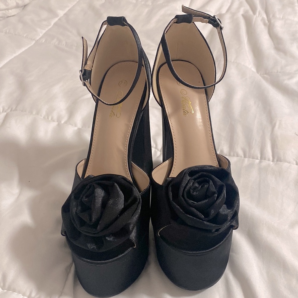 Black chunky heels, never worn.